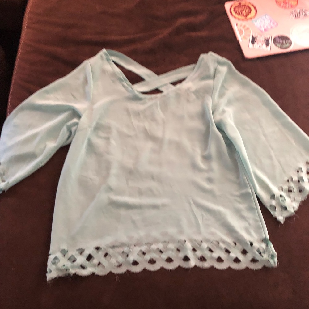 Day trip see thru cross back top